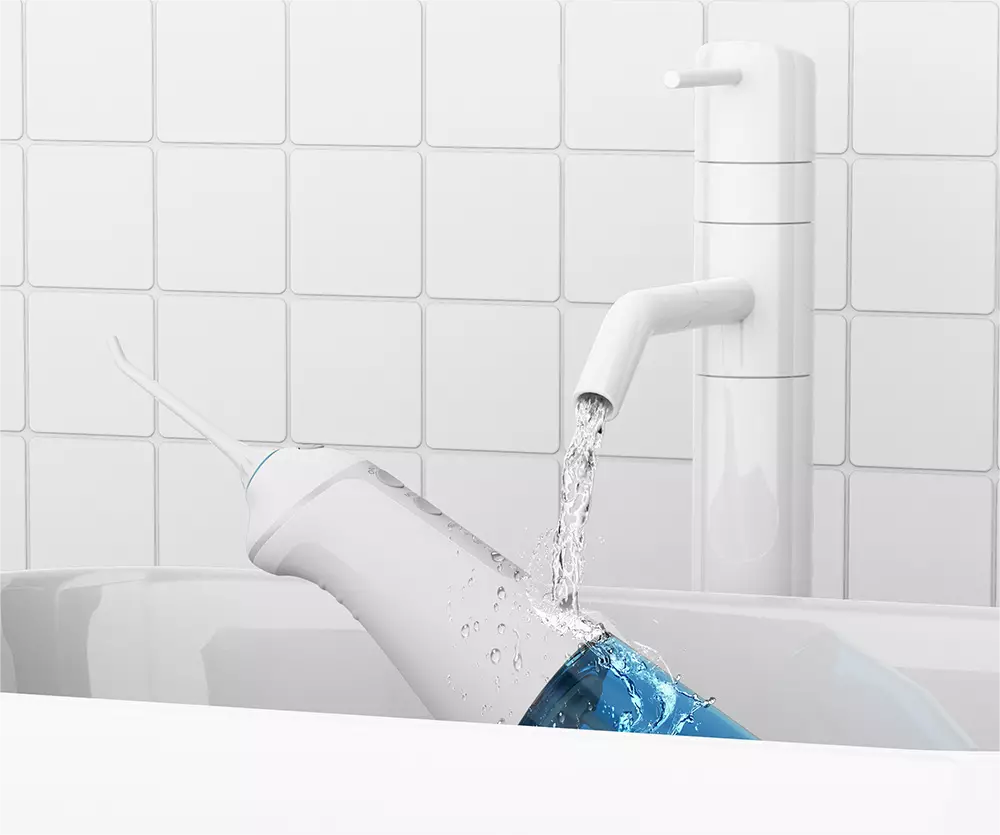 portable oral irrigators